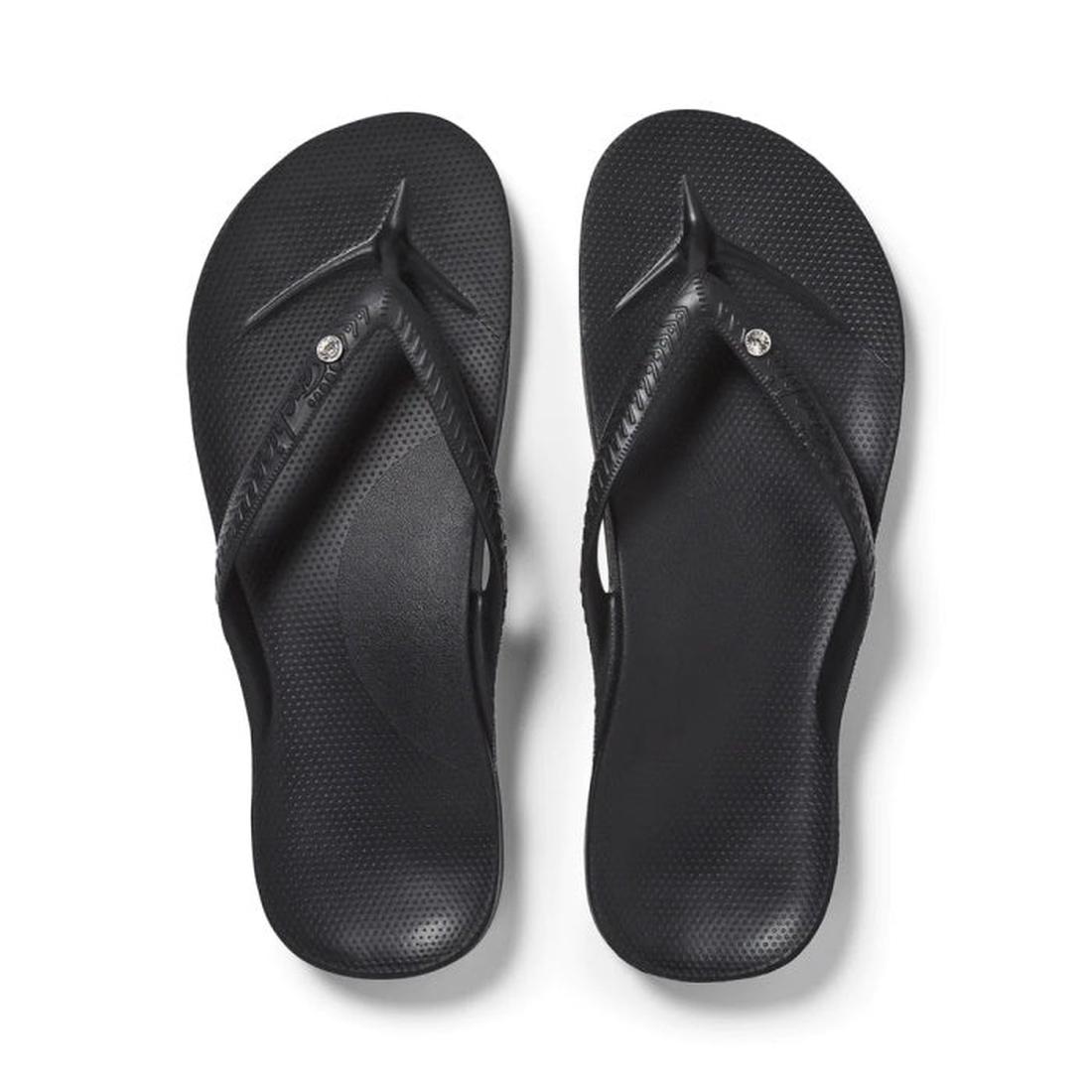 Archies Arch Support Jandal Black Crystal sandals with comfy textured soles and easy-fit diagonal straps, shown in classic black. ksnz