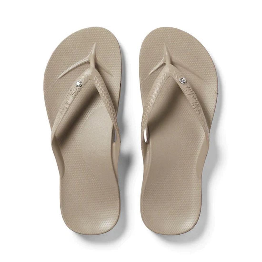 The Archies Footwear Arch Support Jandal in Taupe Crystal offers cozy arch support, grippy soles, and sparkly straps kids will love. ksnz