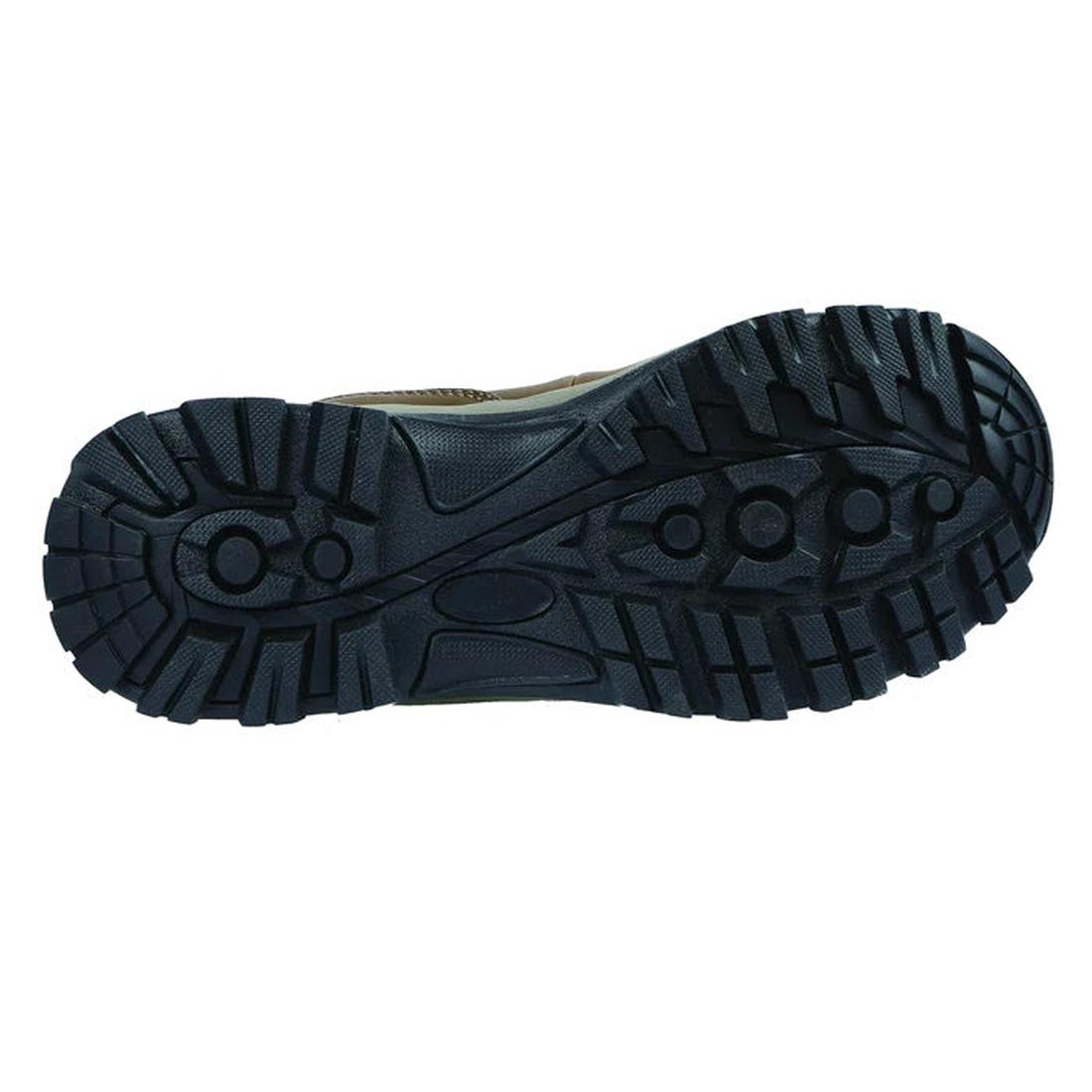 Northside Apex Lite Women's Mid Boot in brown, showing its sturdy black rubber sole with rugged tread for great grip—perfect for adventures. ksnz