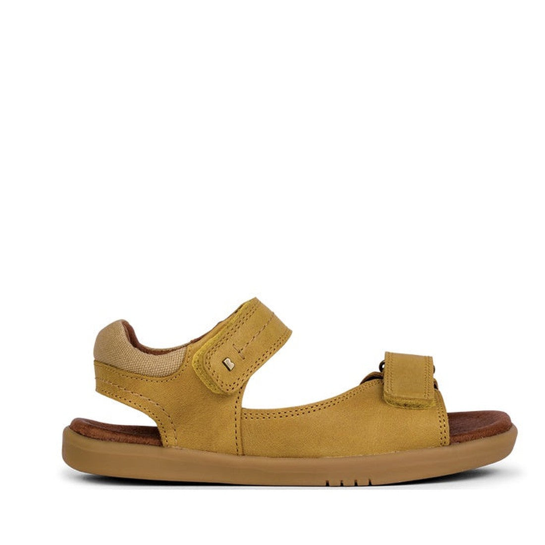 The Bobux Kid+ Plus Driftwood Chartreuse Open Toe Sandal 833507 features a tan and brown adjustable strap, two Velcro closures (ankle and toe), a flat rubber sole, and is photographed on a white background—ideal comfy leather sandals for kids’ adventures.