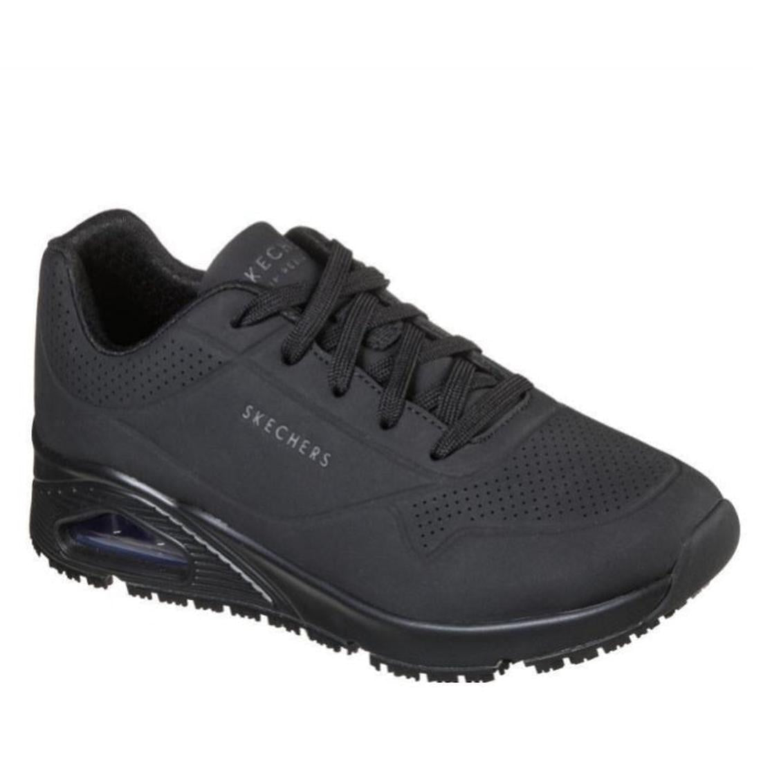 Skechers Uno SR Slip Resistant Women’s Trainer in black, with wide fit, comfy memory foam, thick grip sole, and easy lace-up closure.  ksnz