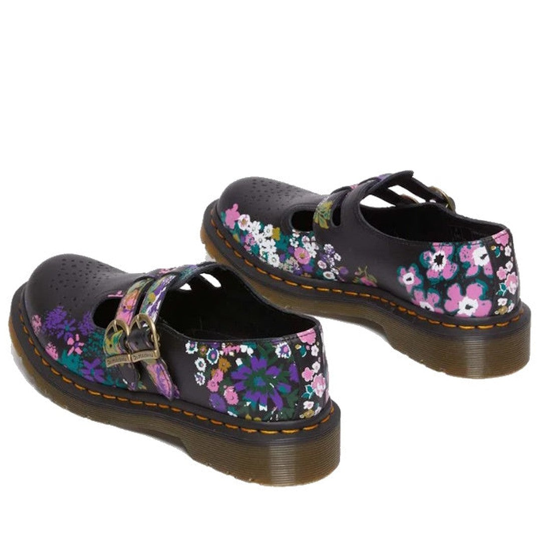The Dr Martens 8065 2 Strap Mary Jane Shoes Vintage Floral Black feature a black base with vintage floral prints in pink, purple, white, and green, plus chunky soles, signature yellow stitching, and gold buckle straps., 190665573091, 190665573107, 1906655