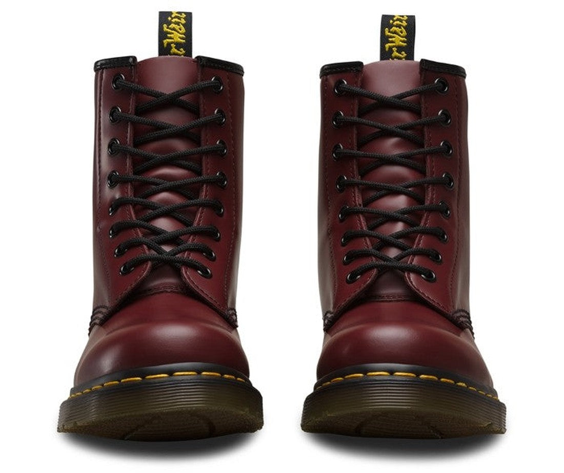 A pair of shiny, cherry red Dr Martens 1460Z DMC 8 Up Boots crafted from smooth leather with black soles and yellow stitching, each featuring a black pull tab with yellow text at the heel., 800090827682, 800090827705, 800090827712, 800090827729, 800090827