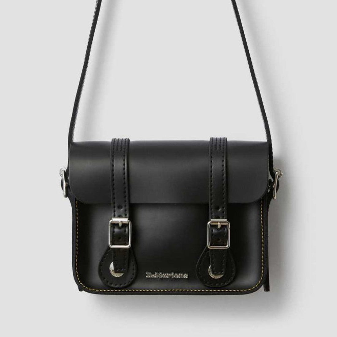 Dr Martens Leather Cross Body Black Satchel: classic black bag with sturdy sole, long strap, secure buckles, and family-friendly design.  ksnz, 190665191974