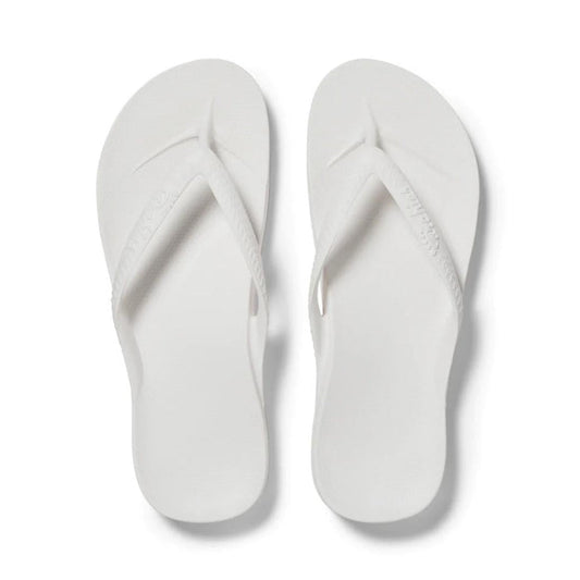 Archies Footwear's Archies Arch Support Jandal White—white sandals with comfy cushioned soles and secure textured straps, top view.  ksnz