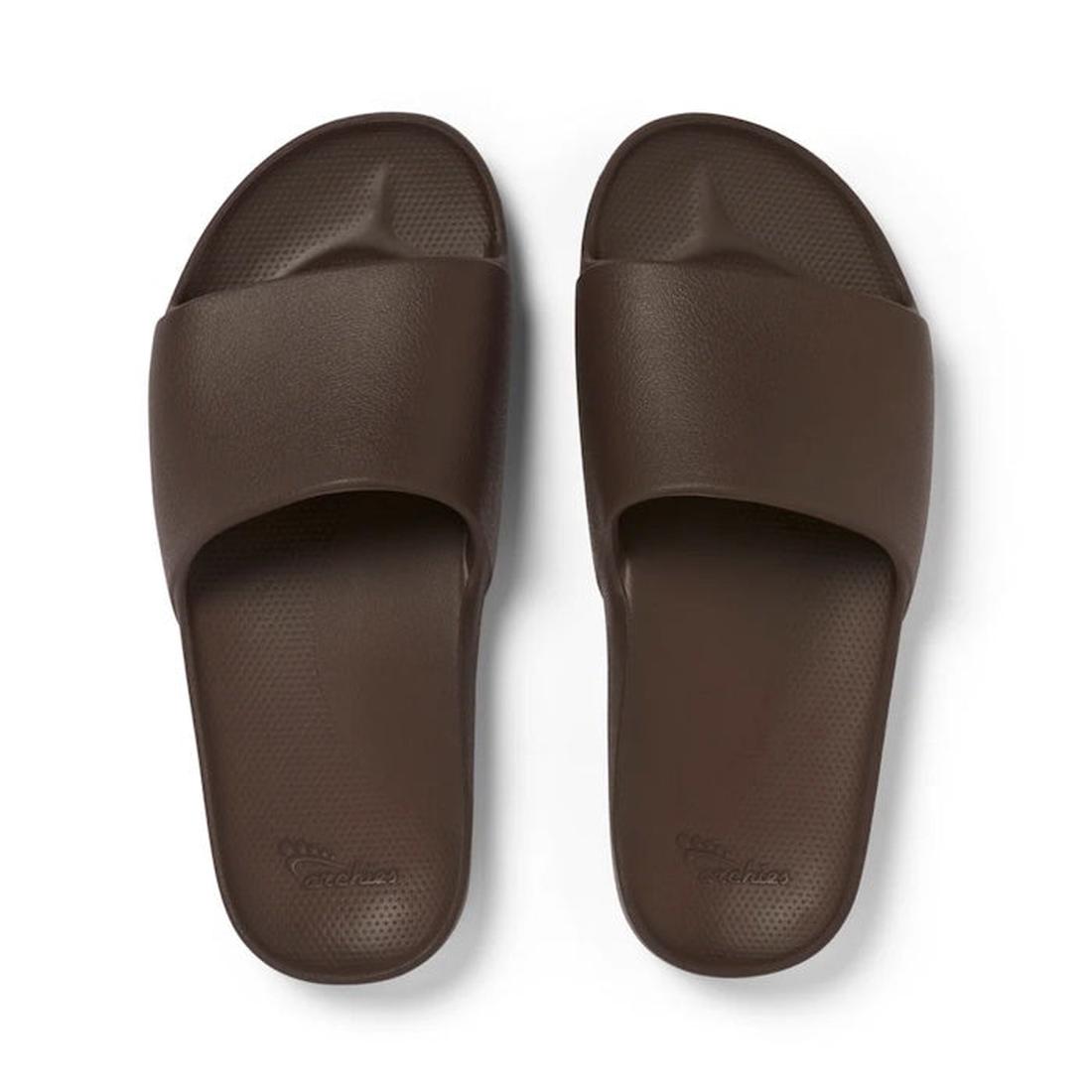 Archies Arch Support Slide in Chocolate Brown—easy slip-on sandal with a wide strap, cozy textured sole, and gentle arch support.  ksnz
