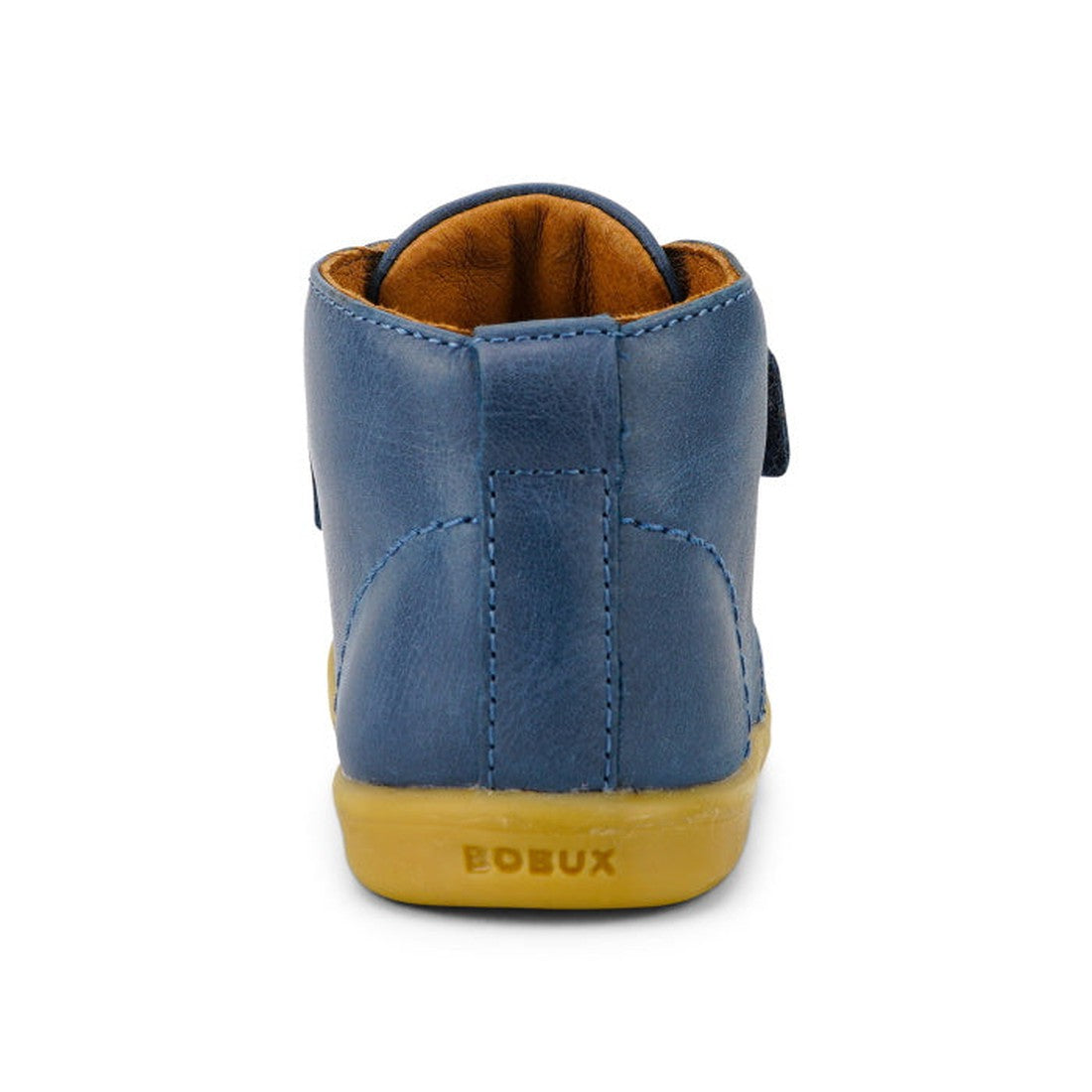 The Bobux Iwalk IW Desert Boot Midnight Blue 625217 is a vintage-style children’s leather boot in blue with a tan sole, brown interior lining, and the BOBUX name embossed on the sole, shown from the back., 9420068516984, 9420068516991, 9420068517004, 9420