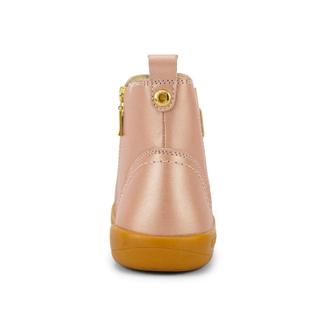 The Bobux Kid+ Jodphur Boot Rose Gold 830021 is a kids' winter boot in pink, seen from the back with a tan sole, gold side zipper, and heel loop—styled after classic Jodhpur boots., 9420075719880, 9420075719897, 9420075719903, 9420068521377, 9420075719927