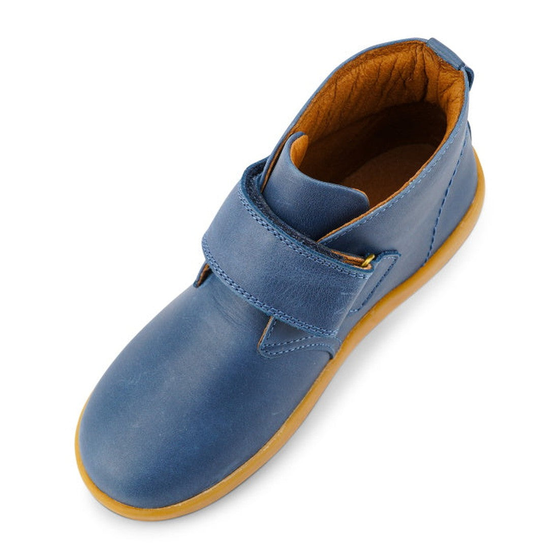 The Bobux Kid+ Desert Boot Midnight Blue 830312 is a unisex boot featuring a blue upper, brown sole, wide Velcro opening across the top, tan lining, and a rounded toe. Shown from above., 9420068517035, 9420068517042, 9420068517059, 9420068517066, 19835, 1