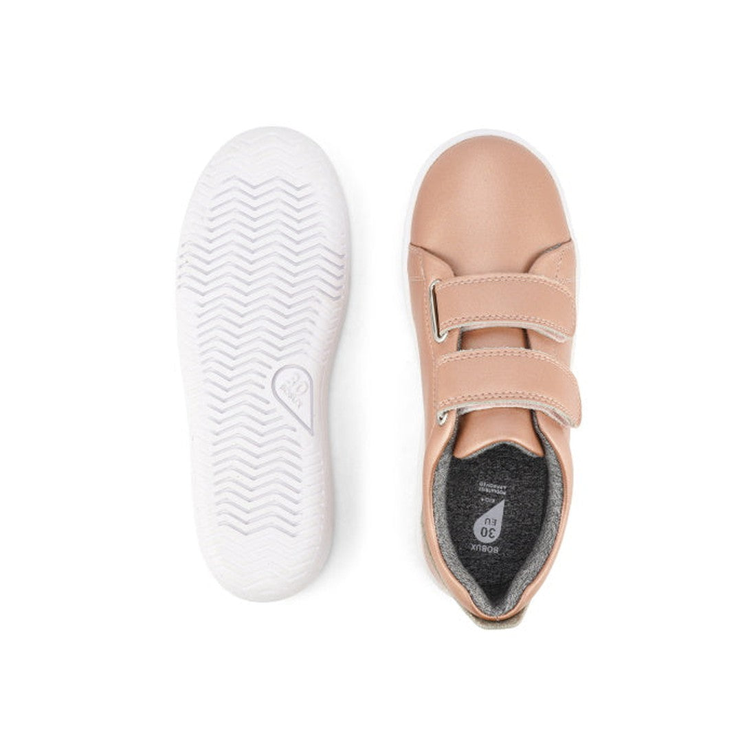 A pair of Bobux Kids + Plus Grass Court Rose Gold Velcro Trainers (832455) for children with a leather upper and double velcro straps; one shoe is shown from above, the other from below to display the white textured sole., 9420071315741, 9420071315758, 94
