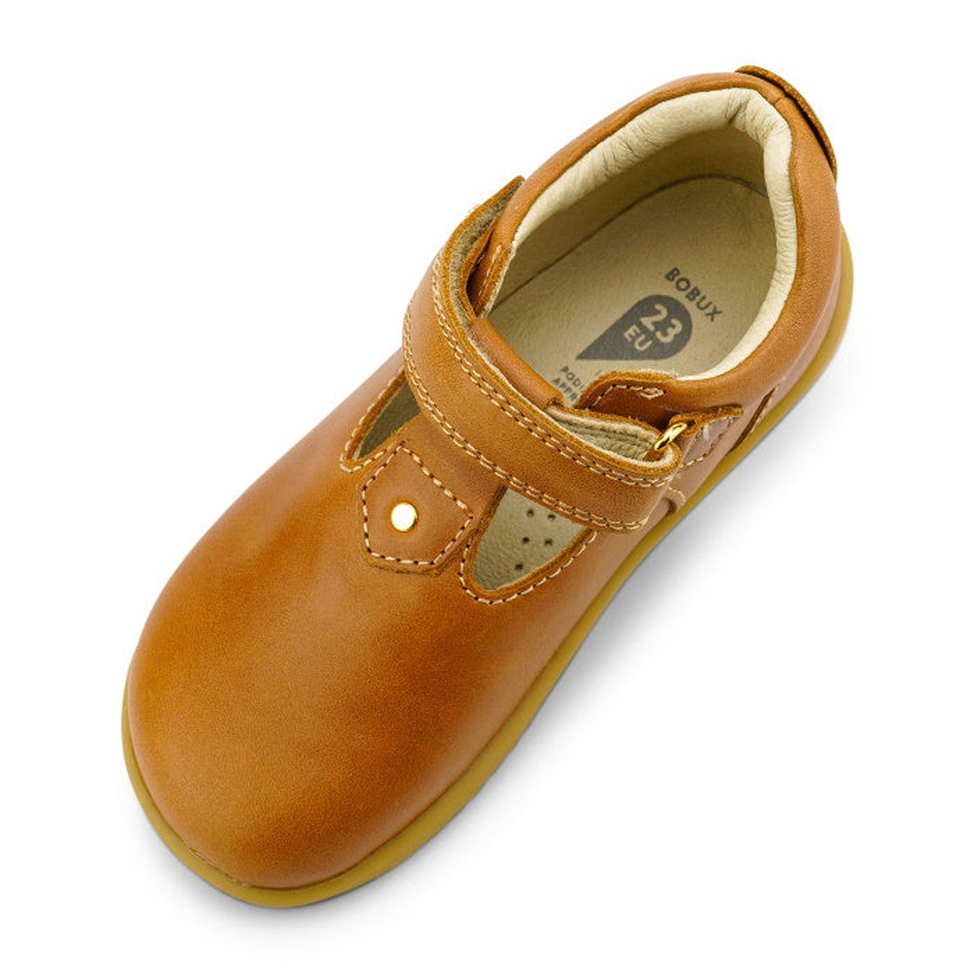 The Bobux Iwalk IW Louise T-Bar Caramel Tan is a children's shoe in brown vintage-style leather with a rounded toe, beige interior, adjustable strap, light brown rubber sole, and insole marked size 23, shown from above., 9420062092170, 9420062092187, 9420