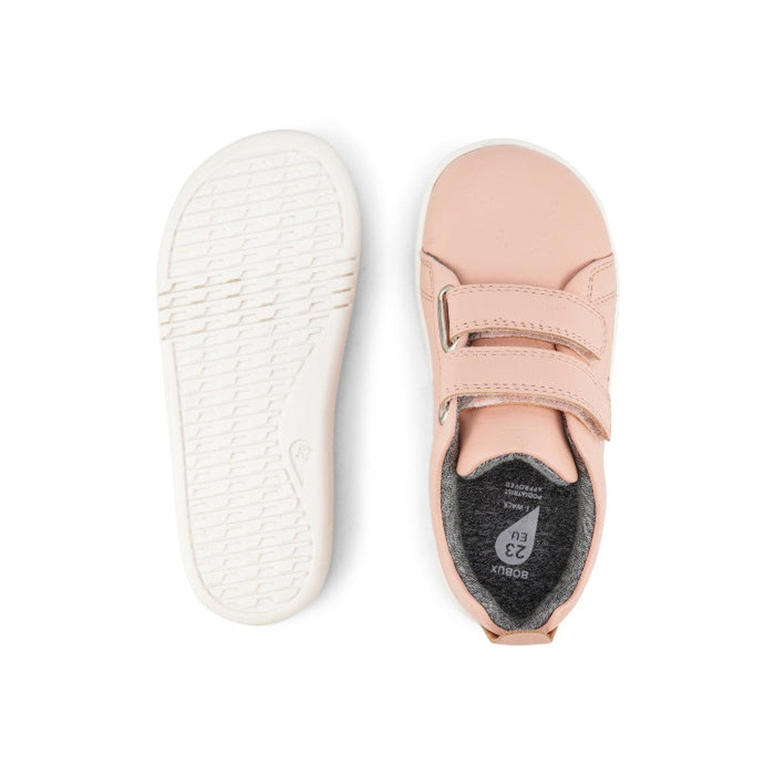 The Bobux Iwalk Grass Court Seashell Pink Leather Trainer (633724/633741) is a unisex toddler shoe with two Velcro straps. Shown from top and bottom, it has a textured white sole for grip, making these comfy sneakers ideal kids’ shoes., 9420062078877, 942