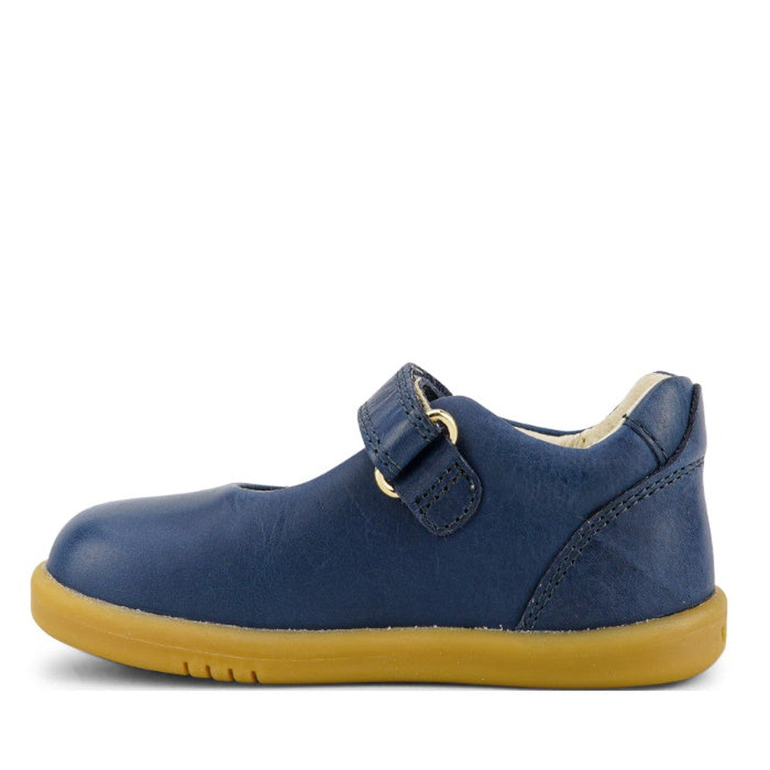 The Bobux Iwalk Delight Mary Jane Midnight Blue 628048 shoe, featuring a leather upper, velcro strap, and light brown rubber sole, is shown in profile facing left against a white background., 9420068516748, 9420068516755, 9420068516762, 9420068516779, 942