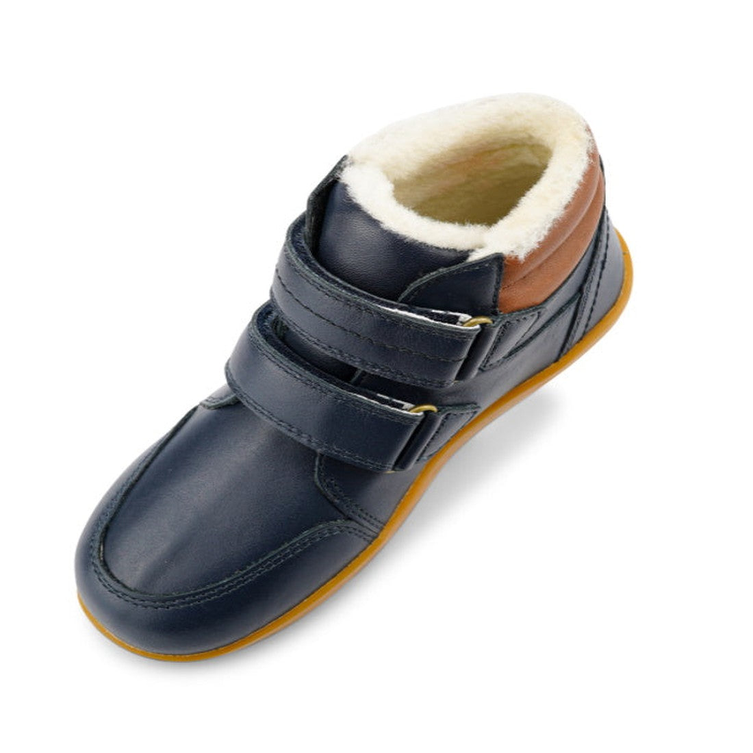 The Bobux Kid+ Timber Arctic WATERPROOF Boot Navy 836003E is shown from an angled top view, featuring two Velcro straps, a brown heel accent, rubber sole, and soft white fleece lining against a white background., 9420068529489, 9420068529496, 942006852950