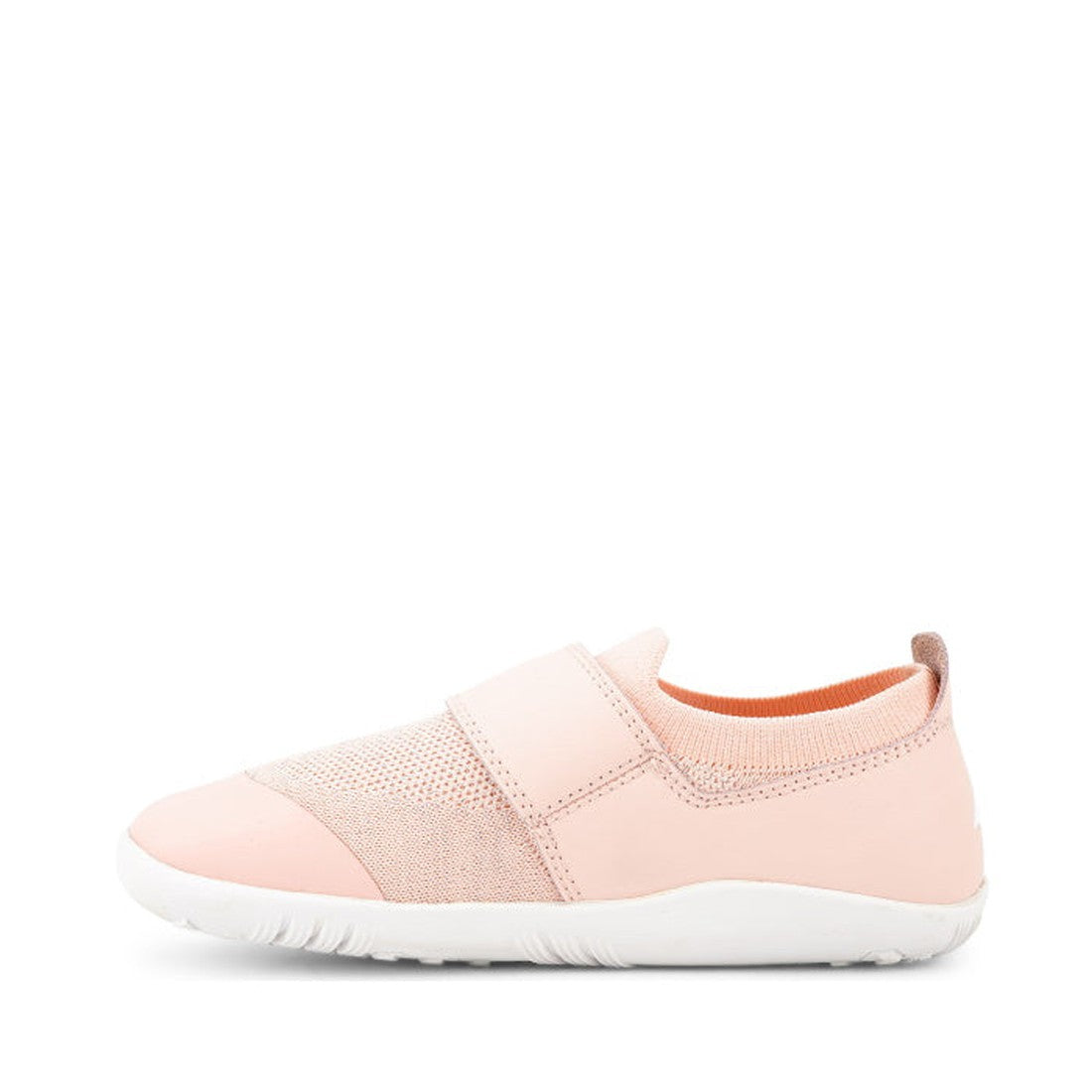 The Bobux Kid+ Lo Dimension III Blossom Pink 838601 CLEARANCE is a kids' light pink slip-on shoe with a mesh upper, wide elastic band, and white flexible sole, shown in a minimal modern design on a white background., 9420068517370, 9420068517387, 94200685