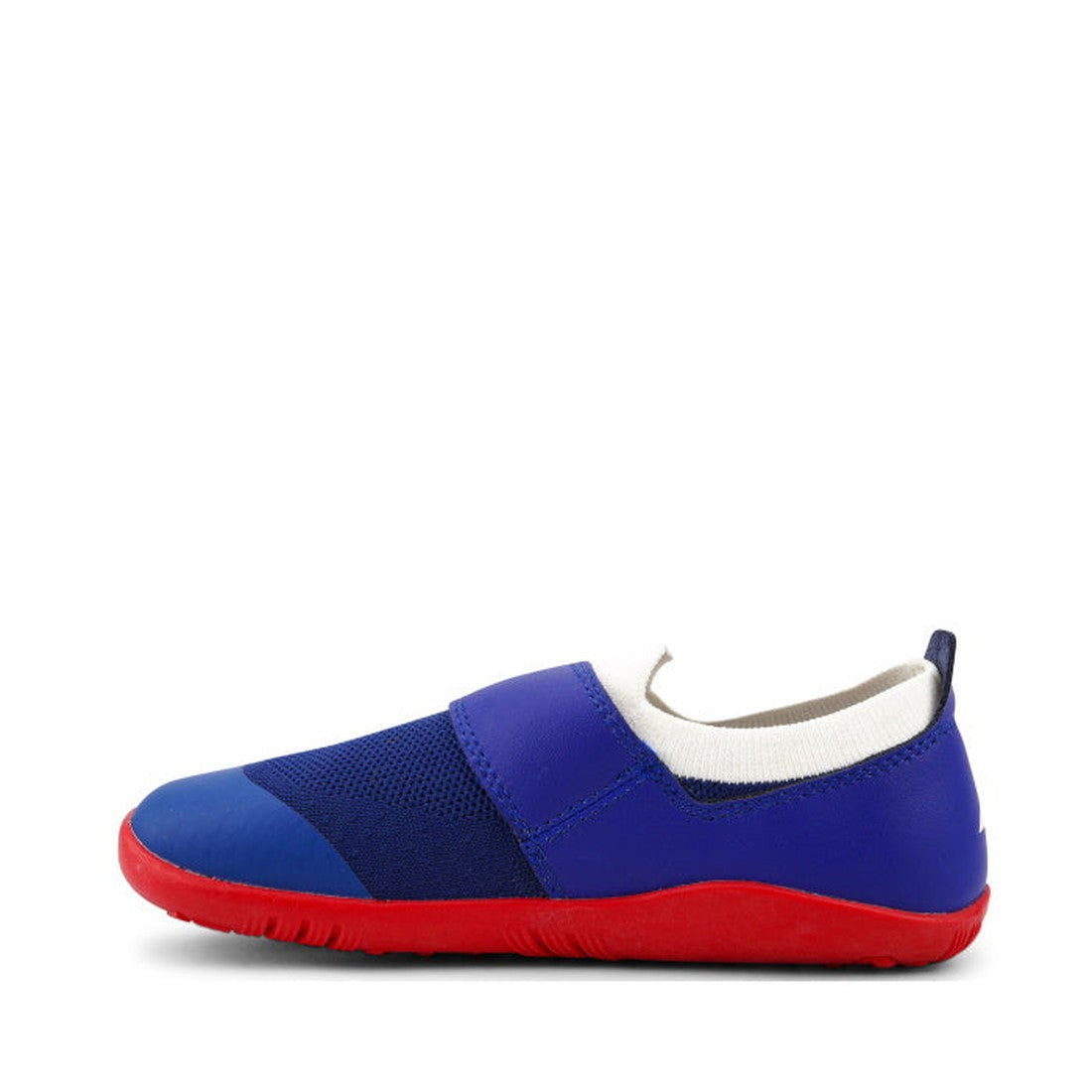 The Bobux Kid+ Lo Dimension III Blueberry 838605 CLEARANCE is a children’s slip-on shoe with a blue upper, white ankle trim, and bright red sole, combining merino comfort with the support of a flexible performance design., 9420068533134, 9420068533097, 94