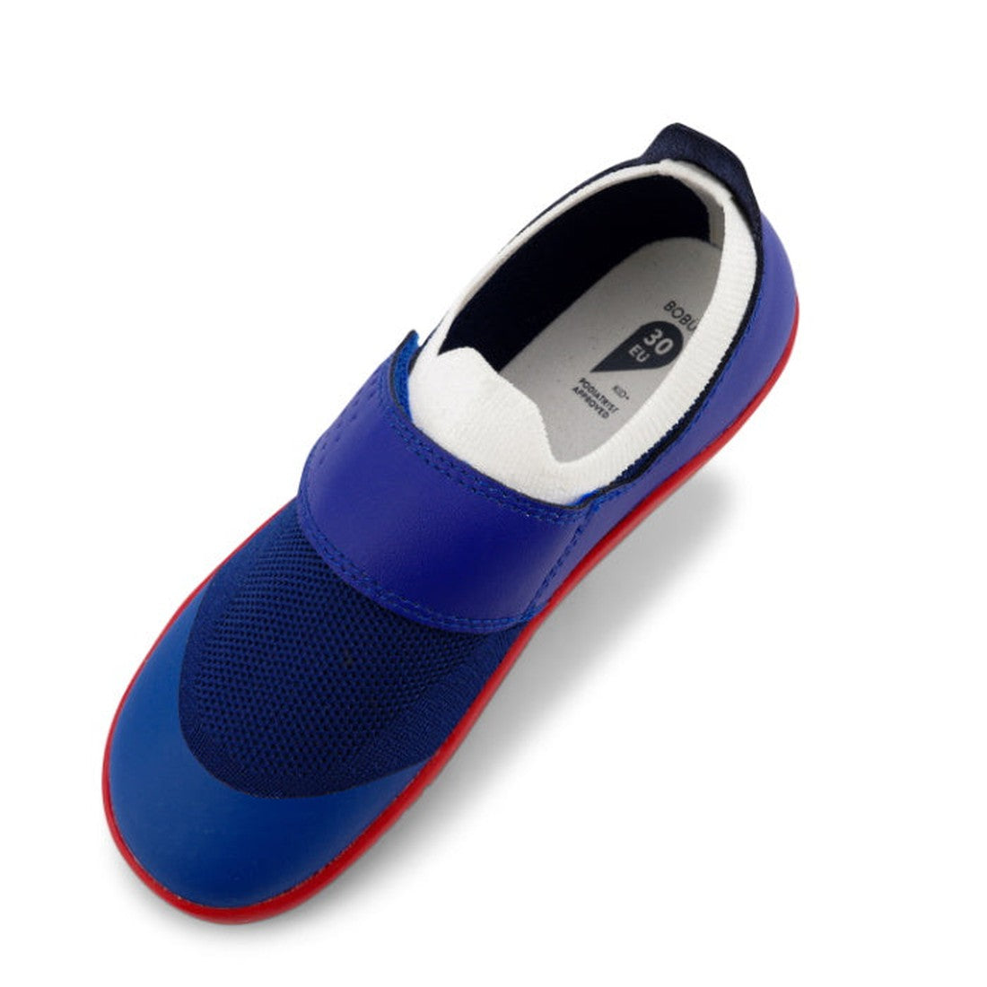 A single Bobux Kid+ Lo Dimension III Blueberry 838605 slip-on shoe features a blue mesh toe, red sole, black accents, elastic band for flexibility, and white inner lining with a visible size label., 9420068533134, 9420068533097, 9420068533080, 94200685331