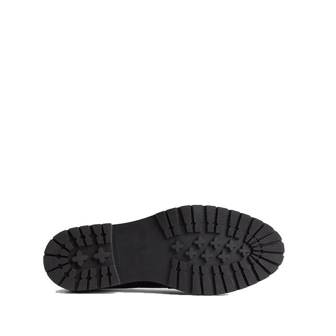 The Barbour Maddie Black Leather Womens Chunky Loafer is shown with a black sole featuring deep, rugged treads and patterns for traction against a white background, highlighting its durable craftsmanship., 51897, 5020985778720, 5020985779352, 502098578006