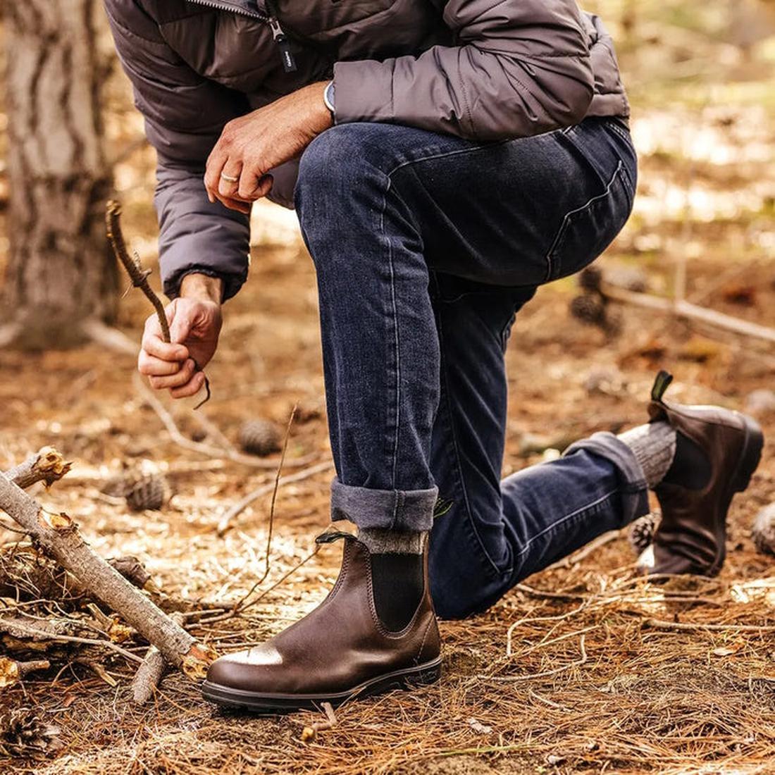 A cozy scene: a person explores the woods in Blundstone Chelsea Boot 2116 VEGAN Brown, with elastic sides and sturdy sole for family fun.  ksnz, 9315891528689, 9315891528702, 9315891528726, 9315891528740, 9315891528764, 9315891528788, 9315891528801, 9315891528825