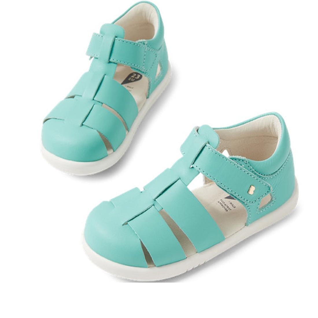 The Bobux Iwalk IW Quick Dry Tidal Sandal in Pool Blue is a children's closed toe sandal with adjustable velcro straps, white soles, and quick dry leather, shown on a white background.