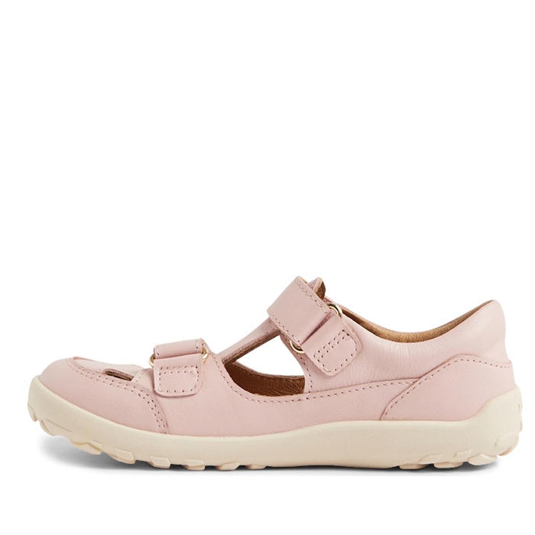 The Bobux Kid+ Troop Leather Closed Toe Sandal in Cameo Rose Pink is a children’s Mary Jane shoe with a wide toe box, two hook-and-loop straps, cut-out details, and a cream rubber sole, shown in side profile on a white background., 9420068562882, 94200685