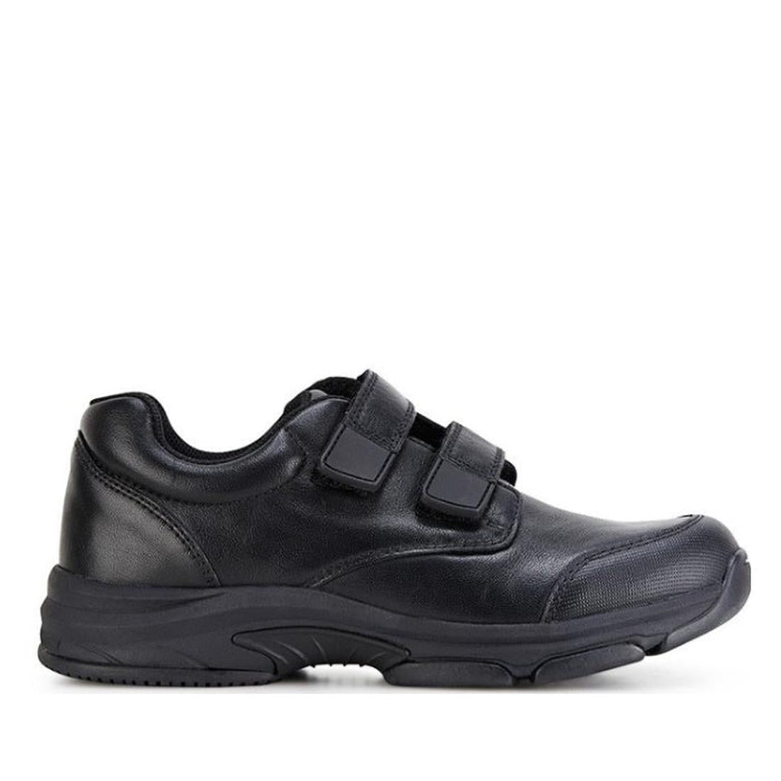 Clarks Approve Kids Black School Shoe—sleek leather, sturdy rubber sole, easy Velcro straps; side view on white background.  ksnz