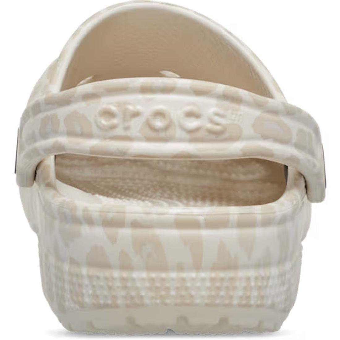 Rear view of Crocs Adults Classic Animal Clog in Almond Tint Leopard, featuring a lightweight design, light leopard print, and adjustable heel strap with the “Crocs” logo., 51497, 198445344978, 198445344961, 198445344985, 51501, 51502, 51503