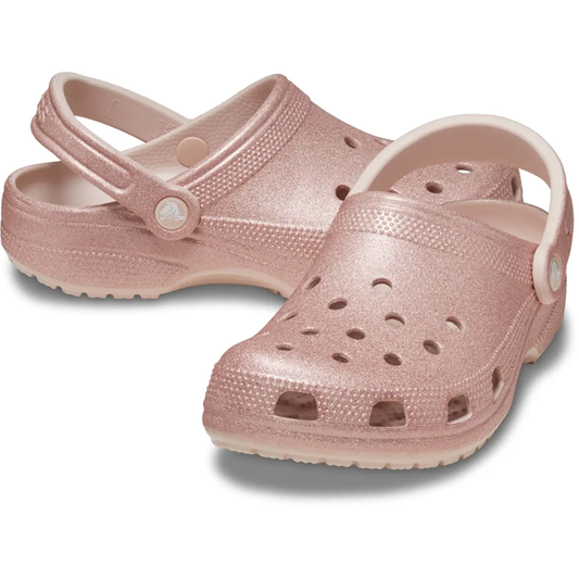 Crocs Classic Clog Adults Quartz Glitter Pink—sparkly light pink slip-ons with comfy soles, heel straps, and breezy ventilation holes.  ksnz