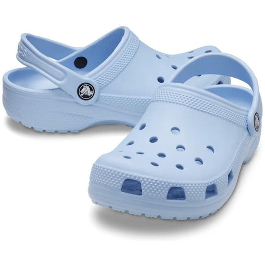 Crocs Kids - Classic Clog K Blue Calcite Youths: cheerful blue slip-on clogs with comfy soles, airy holes, and secure heel straps.  ksnz