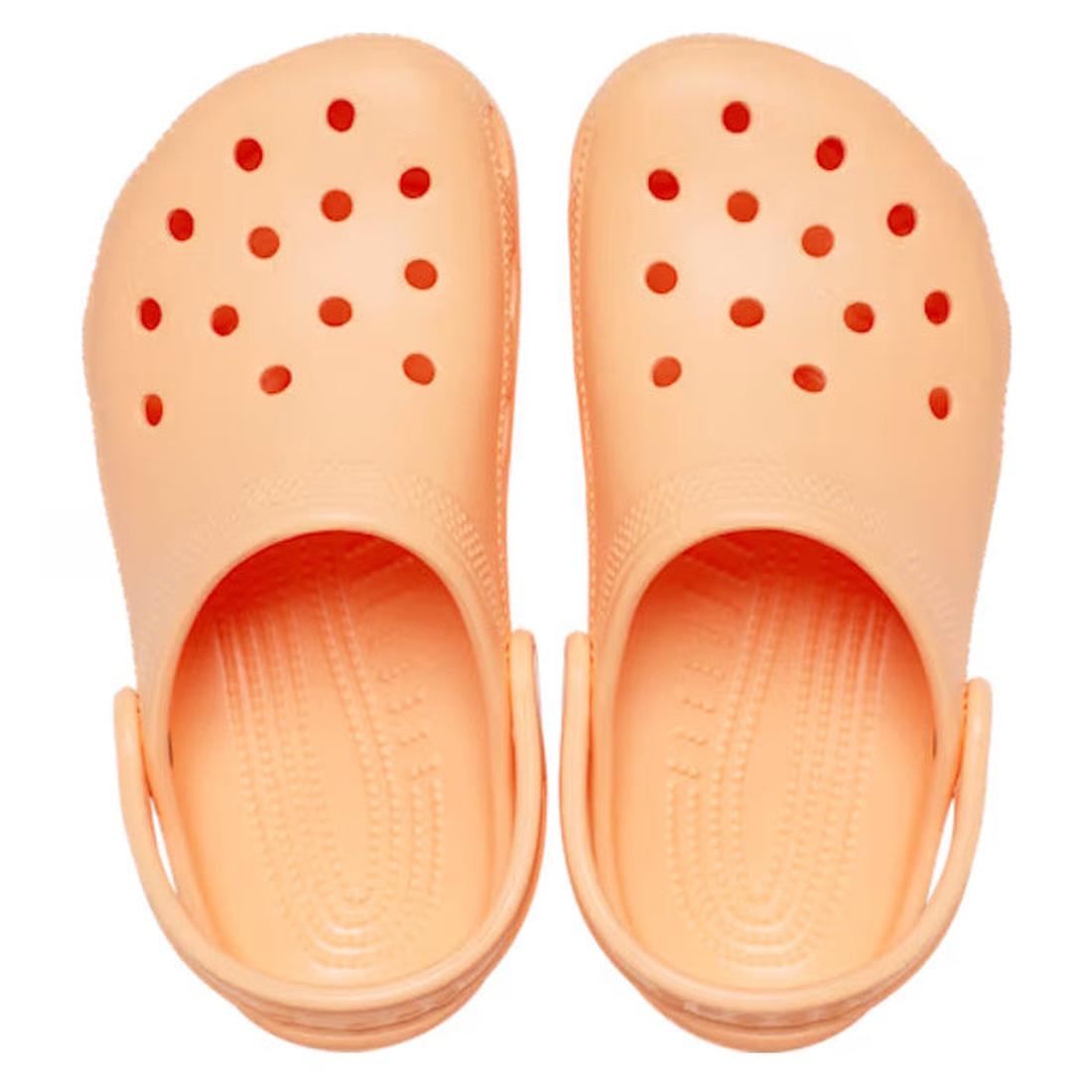 The Crocs Kids Toddlers - Classic Clog Electric Sunstone in toddler sizes are water-friendly sandals with ventilation holes and back straps, shown from above on a white background—ideal for little Crocs fans., 49131, 198445270024, 198445270031, 1984452700
