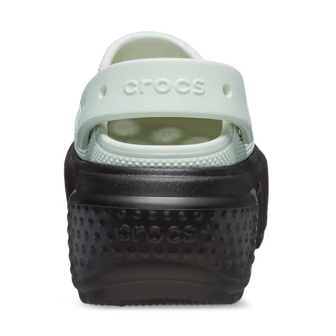 A close-up rear view of the Crocs Stomp Classic Clog Adults Black Linen 2 Tone Platform shows a light green strap, matching upper, thick black chunky sole, and "Crocs" embossed on both the strap and heel., 38834, 196265753932, 196265753949, 196265753956, 