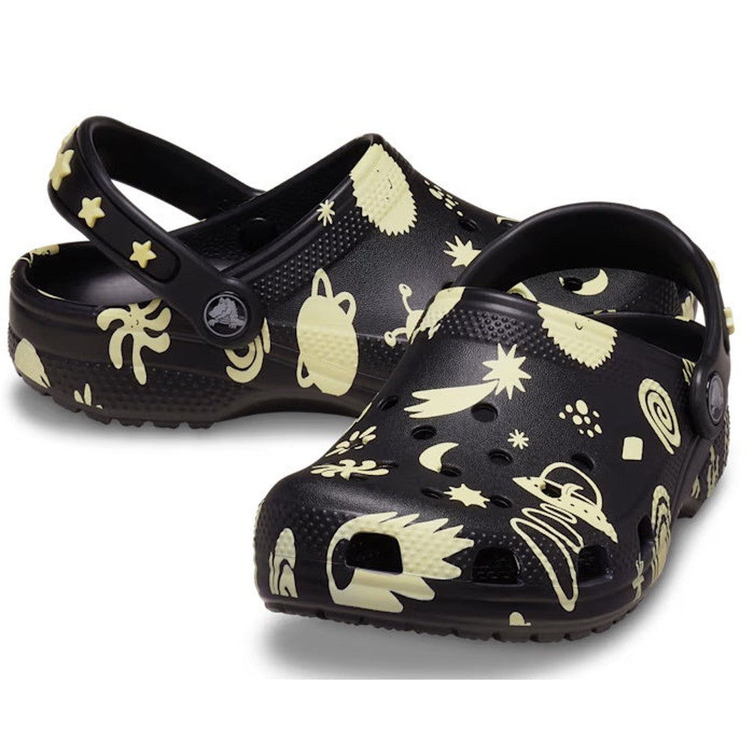 Crocs Kids Youths Classic Glow Space Clog in black—fun glow-in-the-dark stars, secure heel strap, cushioned sole for happy feet.  ksnz