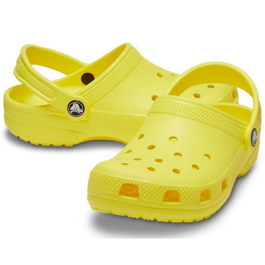 Crocs Kids Classic Clog K in bright Cyber Yellow, easy back strap closure, comfy Croslite sole, with fun ventilation holes.  ksnz