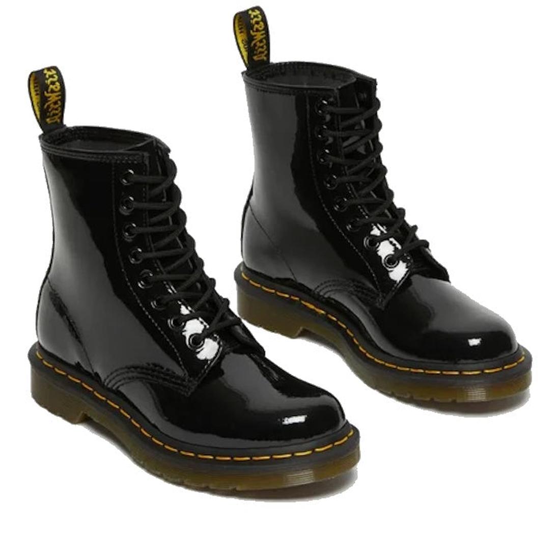 Pair of Dr Martens Patenet black leather boots with yellow stitching on a white background.,
883985035249,
883985035256,
883985035270,, 45130, 45131, 883985035249, 883985035256, 883985035270, 45138, 45139