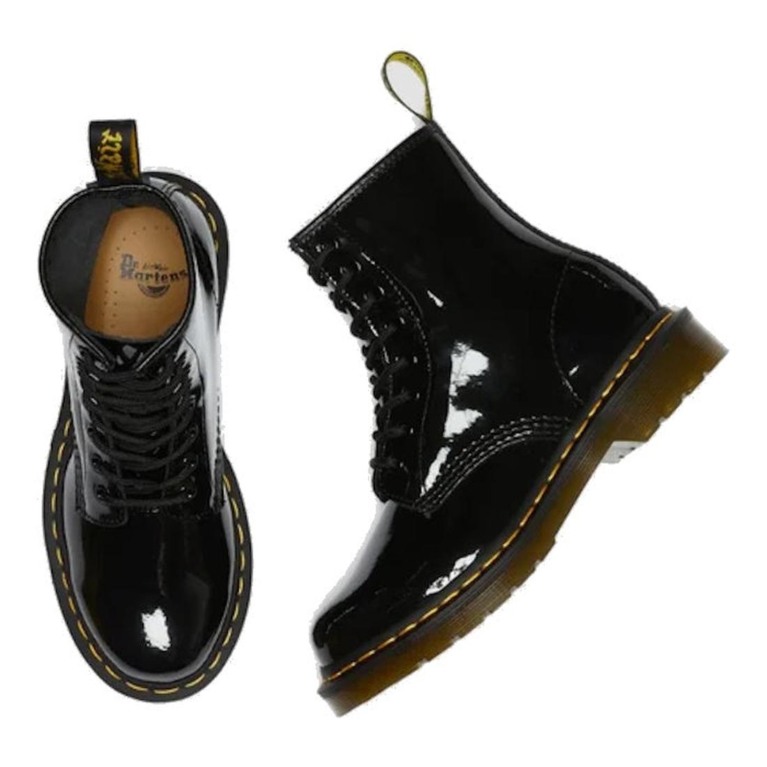 Dr Martens 1460 Black patent leather boots with yellow stitching. One foot side view and one foot top down on a white background.,
883985035249,
883985035256,
883985035270,, 45130, 45131, 883985035249, 883985035256, 883985035270, 45138, 45139