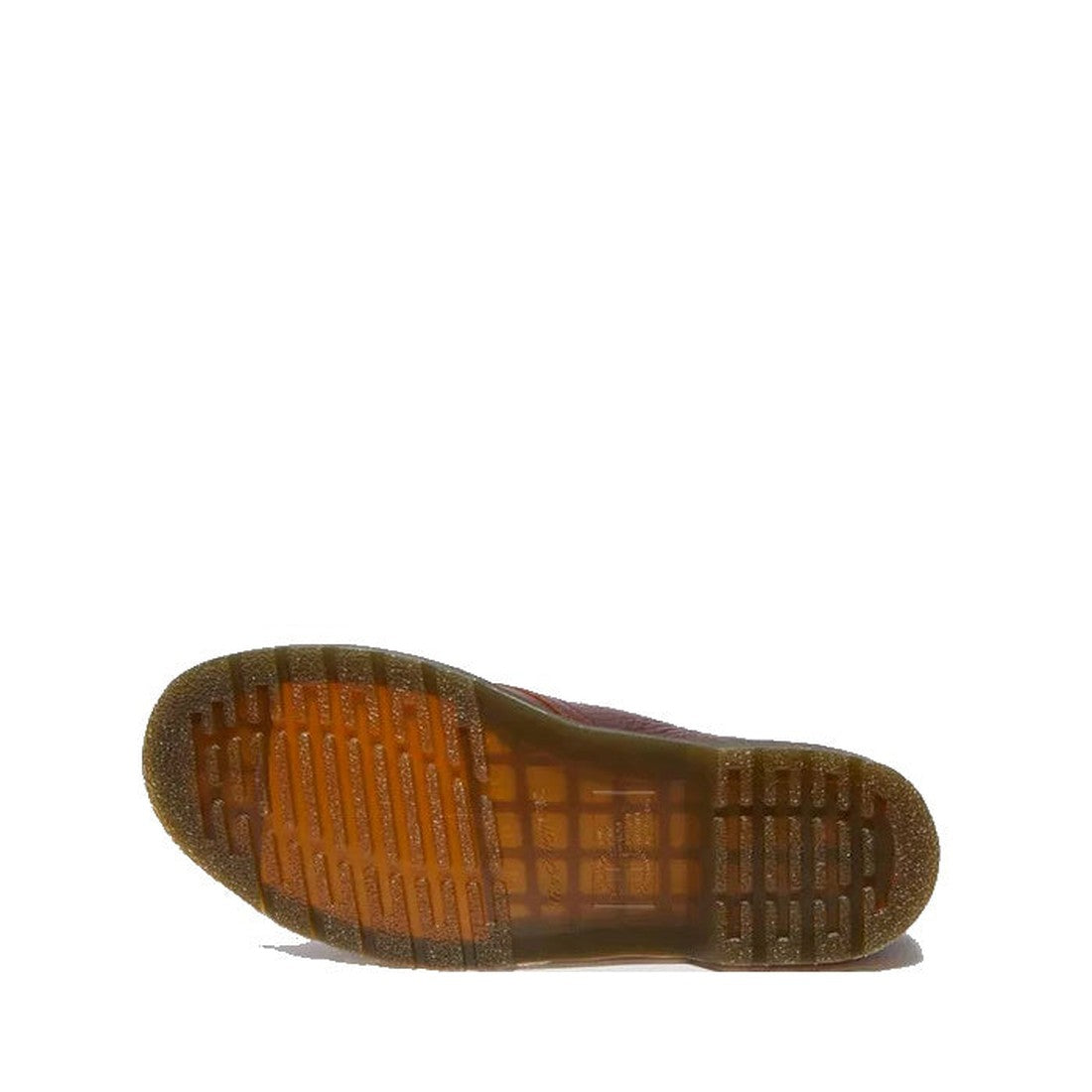The image shows the translucent brown AirWair sole of the Dr Martens 1461 Shoes Cashew Tan Ambassador Leather 3 Eye Lace Up Oxford, with a textured tread pattern of horizontal and vertical grooves, set against a plain white background.