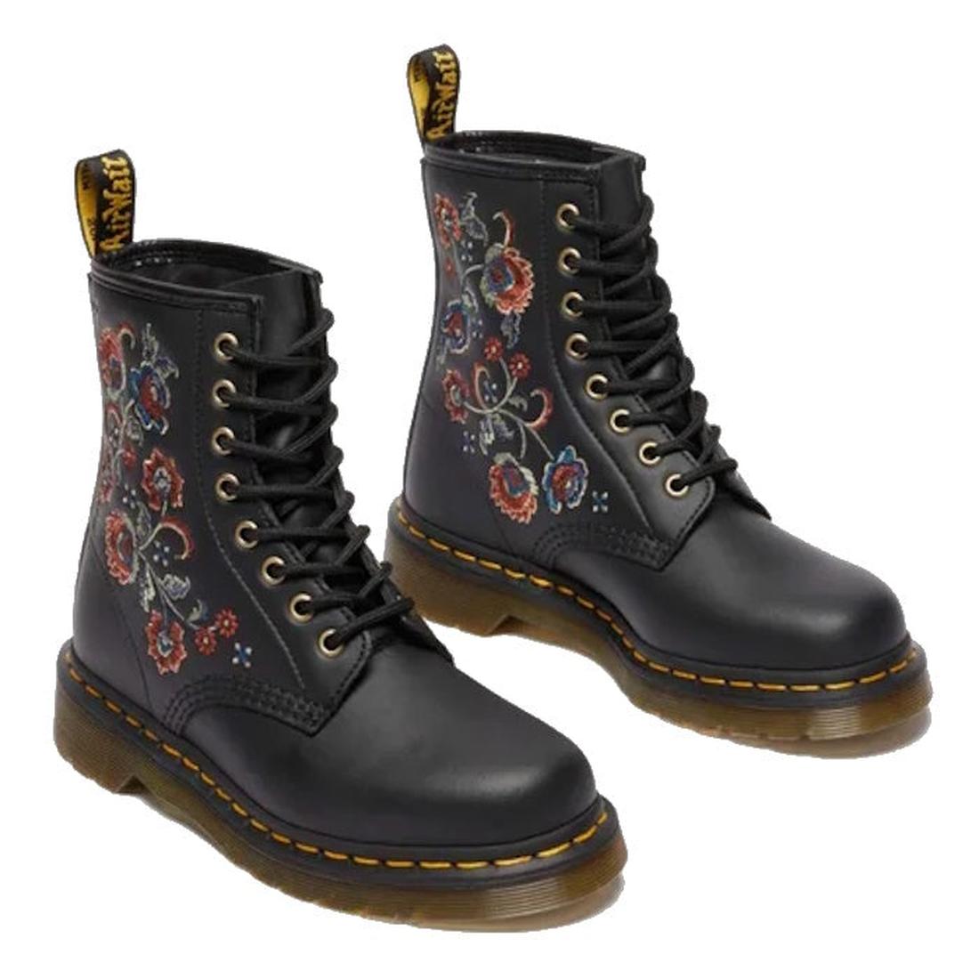 The Dr Martens 1460 Vonda TF Tavern Floral Genix Nappa Leather boots feature black lace-up design, yellow stitching, red and blue floral embroidery on the sides, a translucent brown sole, and a signature yellow pull tab at the back., 47991, 190665742619, 