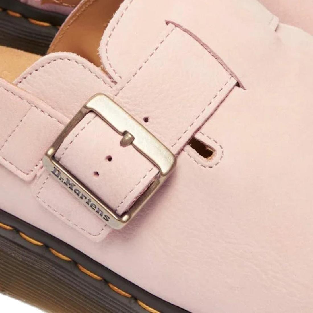 Close-up detal of a pink Dr Martens  Jorge Sandals Mules with a gold buckle, featuring the Dr. Martens logo.,
190665705478,
190665705485,
190665705492,
190665705515,
190665705522,, 45123, 190665705478, 190665705485, 190665705492, 190665705515, 19066570552