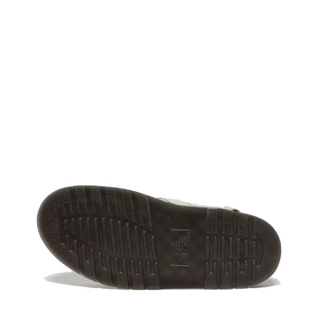 The image shows the bottom view of a single Dr Martens Jorge II Warm Stone Buttersoft Sling Back Sandal Covered Toe sole with textured tread patterns and a flat heel against a white background.