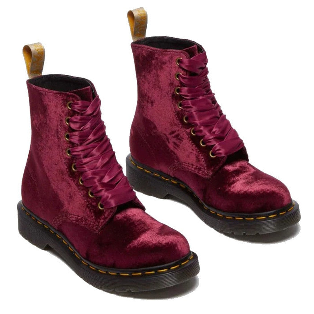 The Dr Martens 1460 Vegan Pascal Cherry Red Velvet 8 Eye Boot features grunge-inspired vegan velvet, thick satin ribbon laces, black soles with yellow stitching, and a brown pull tab at the heel., 42020, 190665660616, 190665660623, 190665660630, 190665660