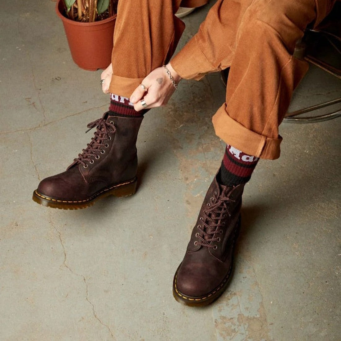 A cozy scene with Dr Martens 1460 Pascal Chestnut Brown Boots—soft leather, classic laces, and sturdy soles for every family outing.  ksnz, 190665542448, 190665542387, 190665542400, 190665542417, 190665542424