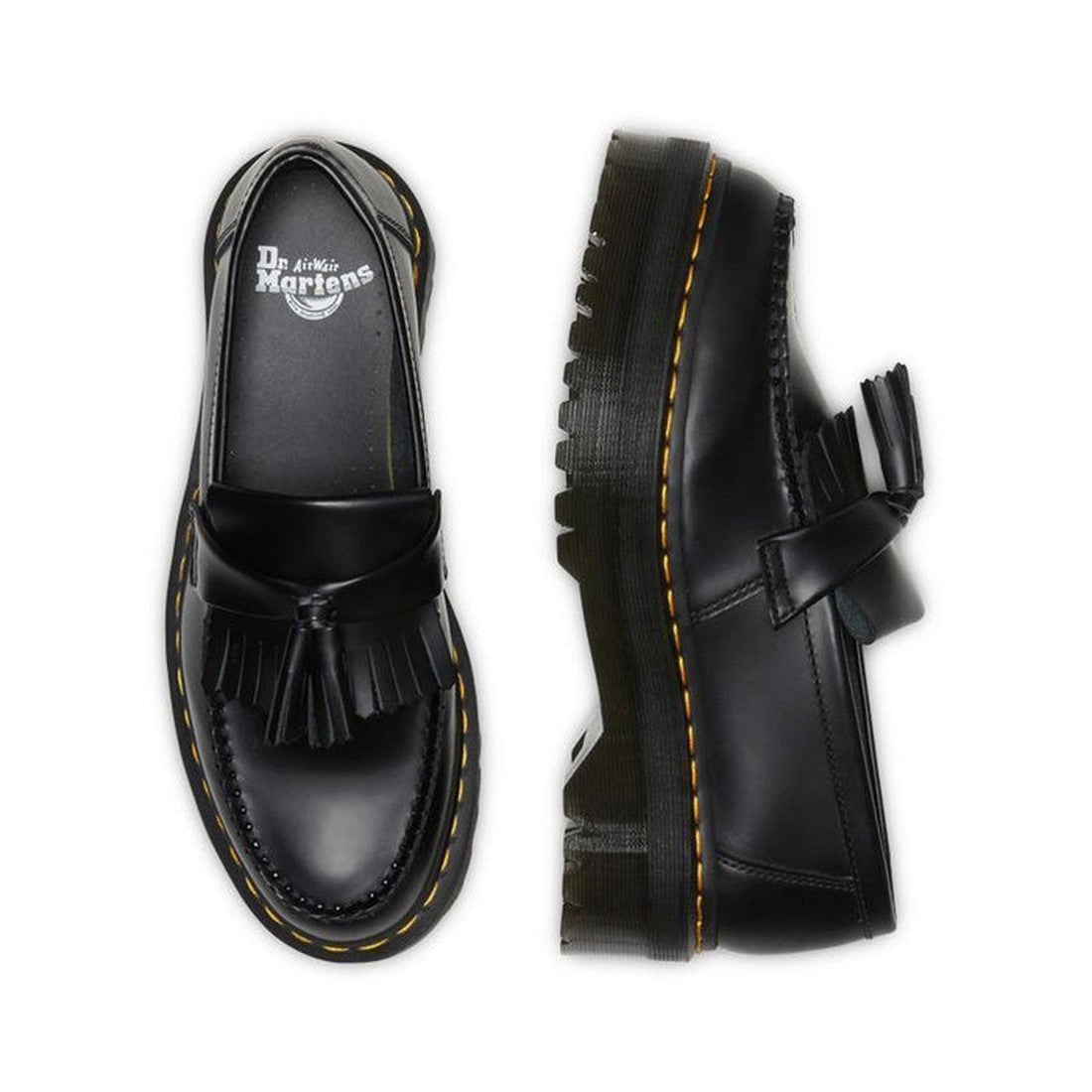 A pair of Dr Martens Adrian Quad Black Smooth Loafer Shoes with tassels, yellow stitching, and chunky treaded Goodyear-welted outsoles—one shown from above, the other from the side., 30429, 30437, 190665522402, 190665522419, 190665522426, 190665522433, 19