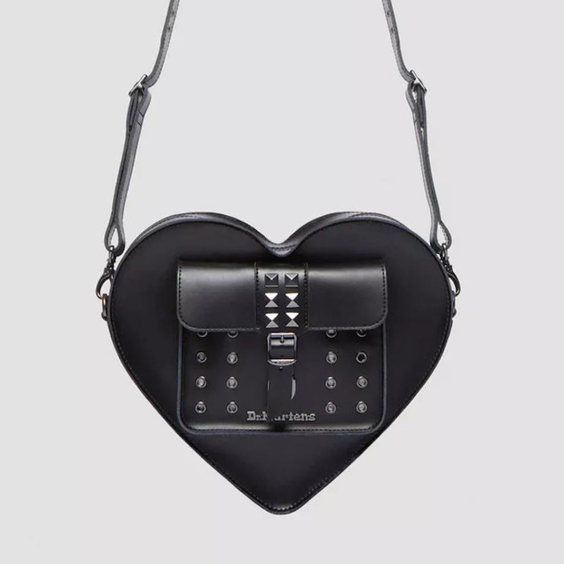 Dr Martens Heart Shaped Bag in black leather with sturdy silver buckle, playful heart design, comfy strap, and secure pocket for kids on the go.  ksnz, 190665728408