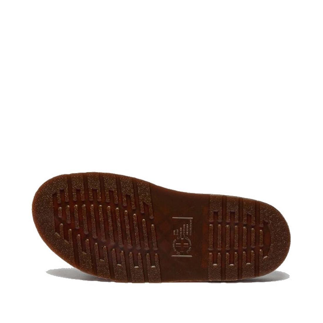 The image shows the bottom view of a Dr Martens Josef Charro Atlas Slide Sandal Leather's brown sole with textured grip patterns and a raised logo. Its Goodyear-welted, durable Atlas leather design is set against a plain white background., 52357, 19066578