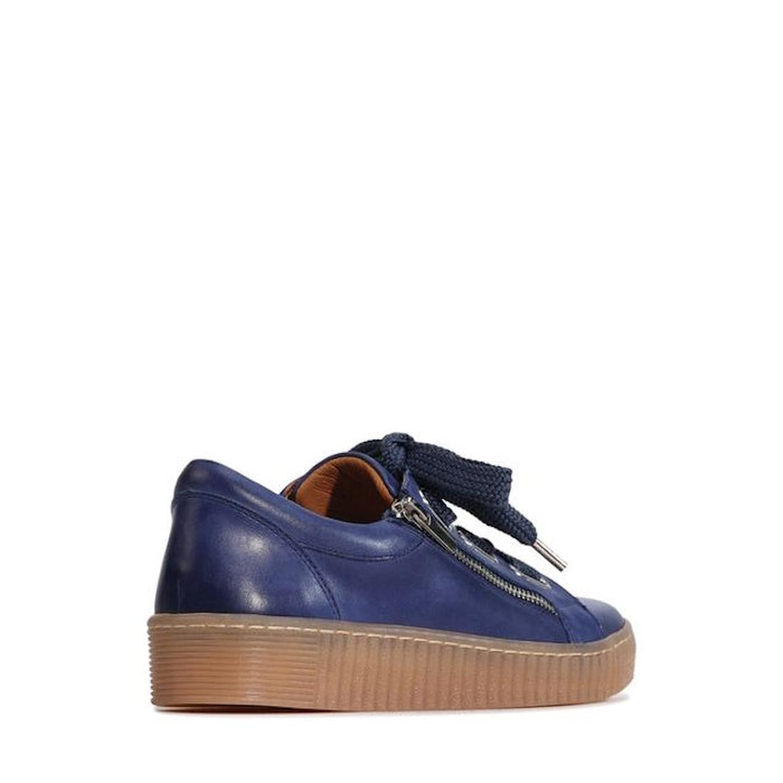 The EOS Jovi Dusk Blue Leather Women's Trainer features a low-top design, lace-up and side zip closure, thick tan rubber sole, and wide navy laces, shown against a white background., 47221, 9321191308623, 9321191308630, 9321191308647, 9321191308654, 93211
