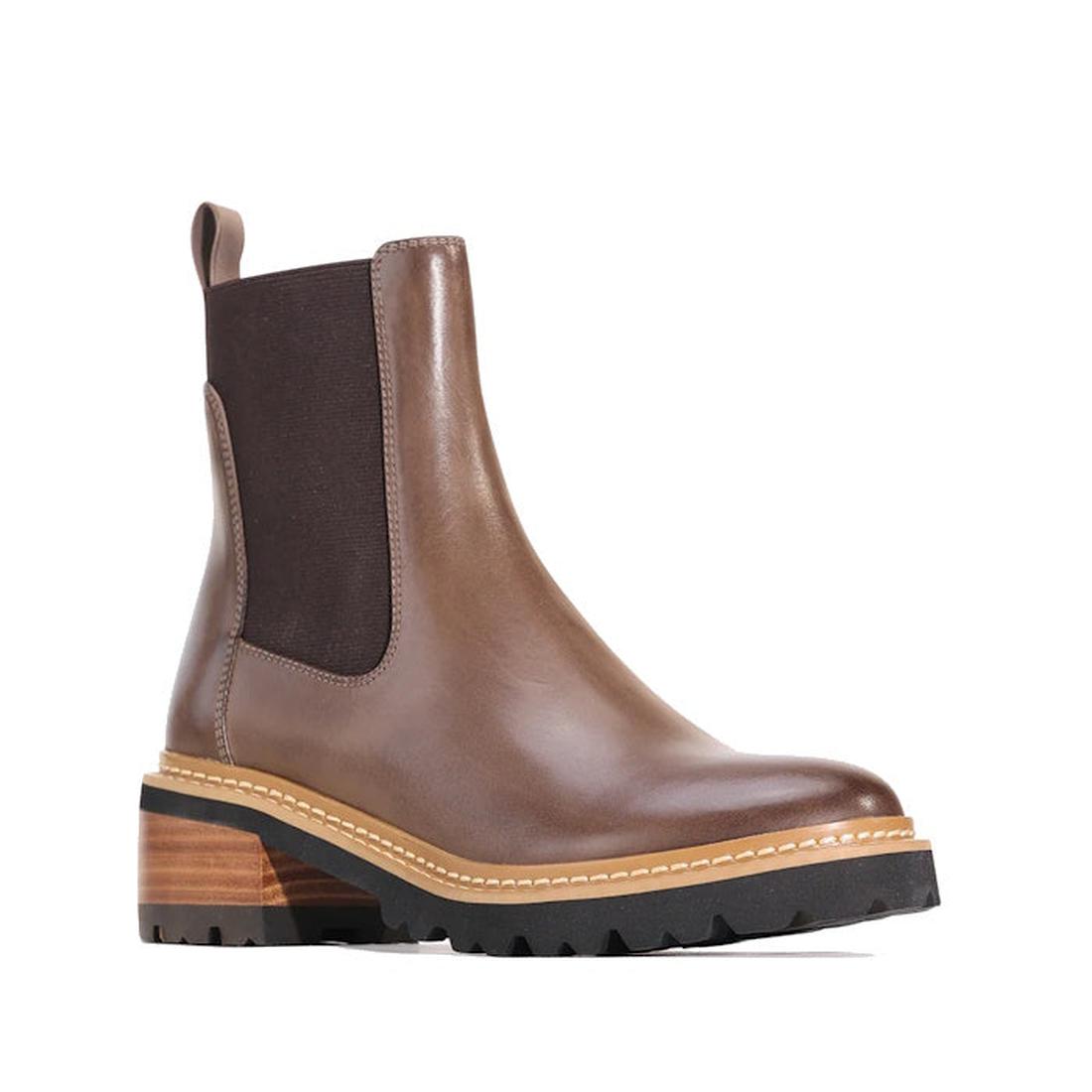 EOS Linear Nocciola Brown Leather Boot is a warm Chelsea pull-on with sturdy wooden heel, easy back tab, grippy sole, and side stretch panels.  ksnz