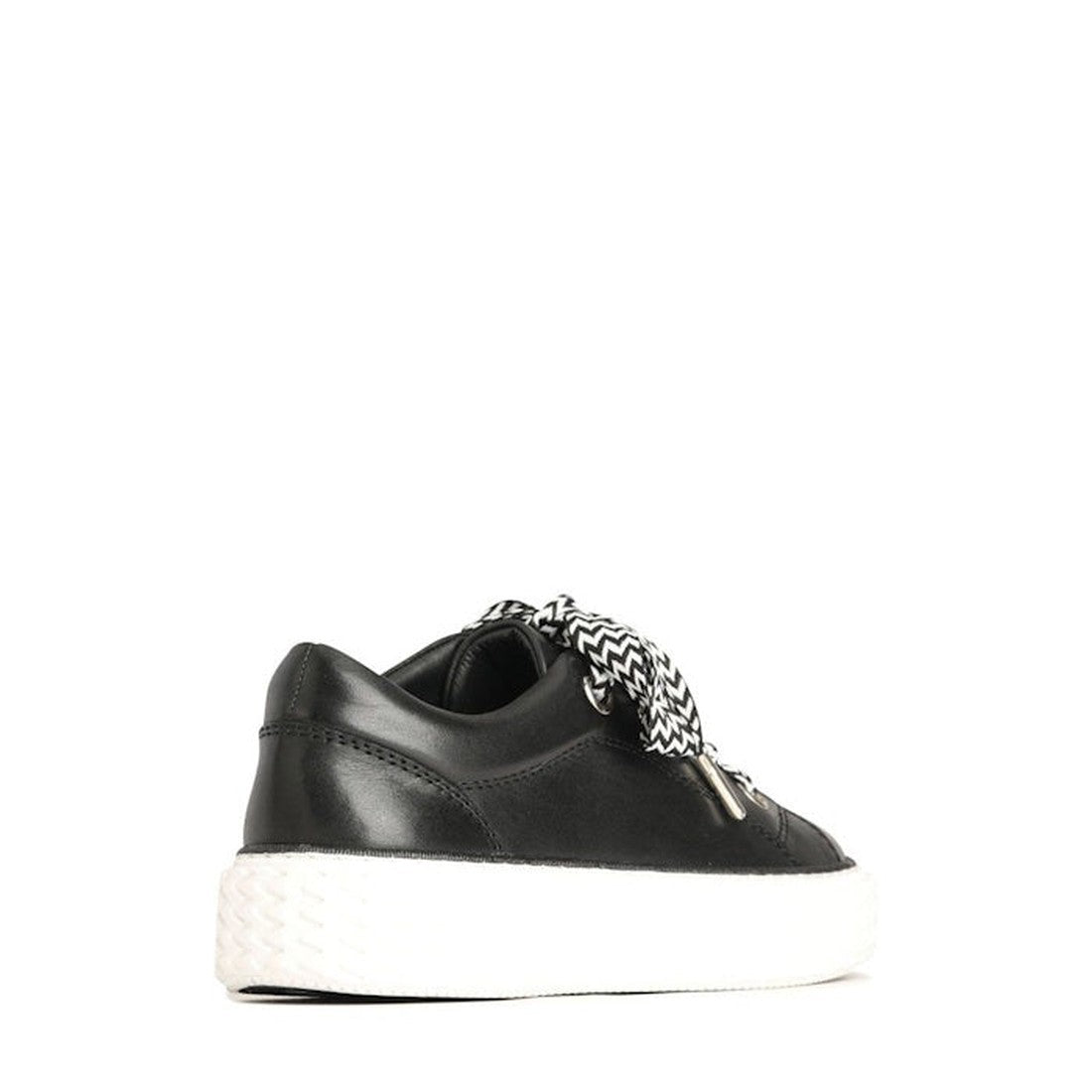 The EOS Trinsic Black Leather Lace Up Trainer is a black low-top sneaker in cashmere leather, shown from the rear side. It features black-and-white patterned laces, a chunky chevron outsole, and is set against a plain white background., 36520, 93211912008