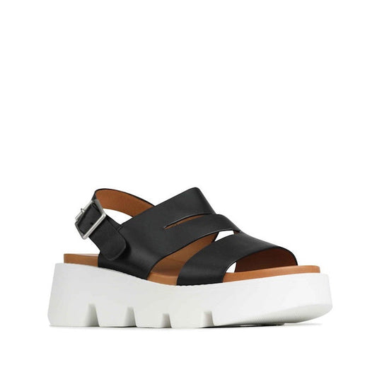 EOS Womens Kaili Platform Chunky Leather Sandal in black, with comfy wide straps, a secure buckle, open toe and back, and grippy white sole.  ksnz
