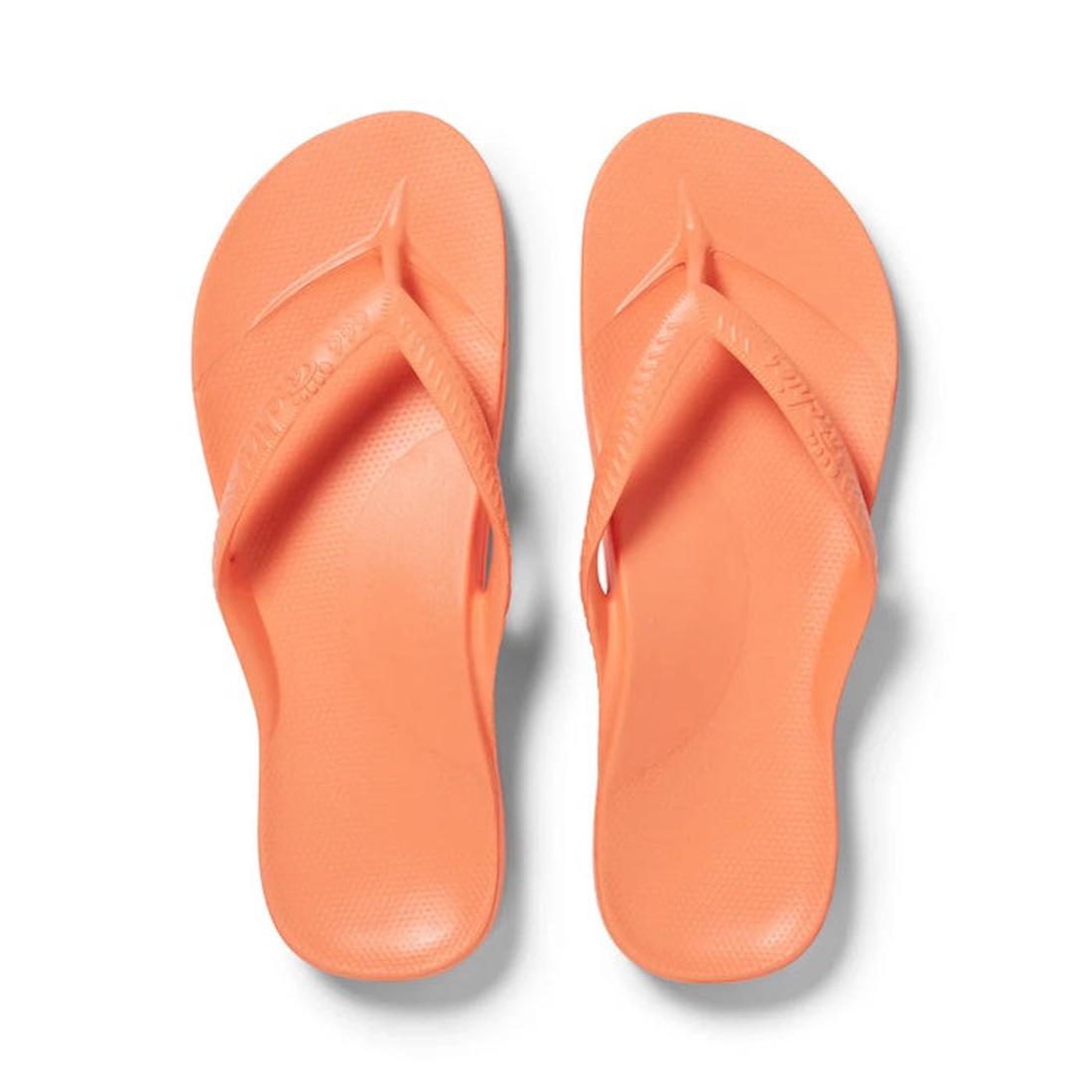 Archies Arch Support Jandal Peach sandals, comfy textured sole and easy slip-on style, perfect for family summer fun on a white background.  ksnz