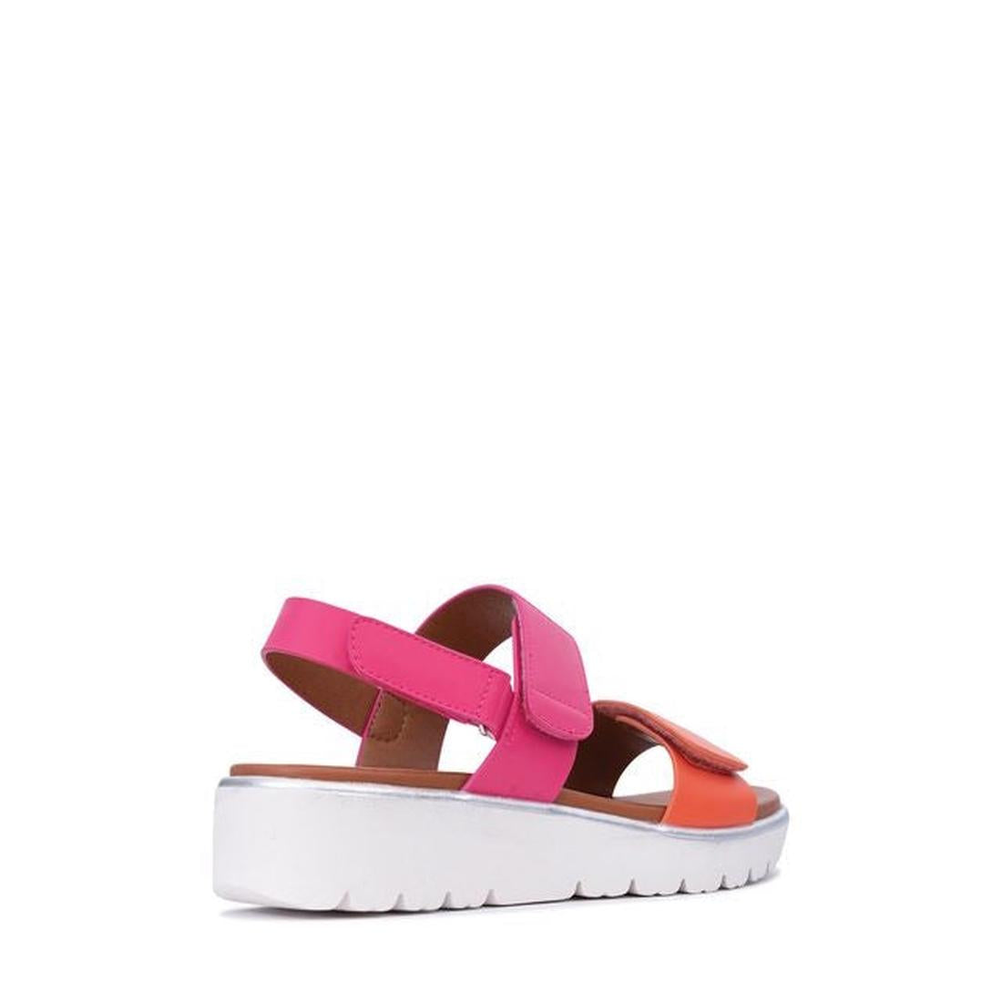 The Los Cabos Arica Orange Fuchsia Summer Women's Sandal features a thick white sole, pink ankle and heel straps, an orange toe strap, and an adjustable back strap for a secure fit, shown from a rear side angle against a white background., 9321191293004, 